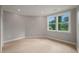 This bedroom boasts hardwood floors, natural light, and is freshly painted, making this a cozy and welcoming retreat at 621 Bon Air Ave, Durham, NC 27704