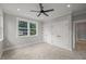 Inviting bedroom with carpeting, recessed lighting, a ceiling fan, and a double door closet that offers both style and comfort at 621 Bon Air Ave, Durham, NC 27704