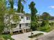 Charming two-story home with white siding, black shutters, and a welcoming front porch at 621 Bon Air Ave, Durham, NC 27704