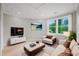 Spacious living room with hardwood floors, a large window, and neutral walls that provides a cozy and inviting atmosphere at 621 Bon Air Ave, Durham, NC 27704