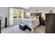 Bedroom with a large window, providing a view of the outdoors at 704 N Orange Ave, Dunn, NC 28334