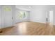 Bright and airy living room with hardwood flooring and natural light at 705 Hartford Rd, Raleigh, NC 27610