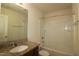Clean bathroom featuring a bathtub with shower and a granite countertop vanity at 802 Brier Crossing Loop, Durham, NC 27703