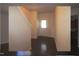 Bright foyer featuring hardwood floors and a view into the kitchen at 802 Brier Crossing Loop, Durham, NC 27703