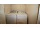 Laundry area includes a white washer and dryer, offering convenience and efficiency at 802 Brier Crossing Loop, Durham, NC 27703