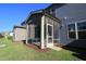Screened-in patio with a view of the backyard and trees, offering a relaxing outdoor space at 802 Brier Crossing Loop, Durham, NC 27703