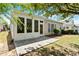 The patio in the backyard provides a relaxing space for outdoor enjoyment and relaxation at 803 Footbridge Pl, Cary, NC 27519