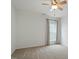Empty bedroom with neutral carpet and ceiling fan at 803 Footbridge Pl, Cary, NC 27519