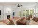 Comfortable living room featuring a fireplace, hardwood floors, and a cozy seating arrangement at 803 Footbridge Pl, Cary, NC 27519