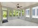 Bright sun room with lots of light, and a ceiling fan at 803 Footbridge Pl, Cary, NC 27519