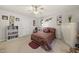 Spacious bedroom with plush carpet, natural light, and large wardrobe at 8520 Quarton Dr, Raleigh, NC 27616