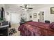 Bright bedroom with plush carpet, ceiling fan and wardrobe at 8520 Quarton Dr, Raleigh, NC 27616