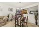 Cozy dining space with an adjacent living room that provides ample space for entertaining and relaxation at 8520 Quarton Dr, Raleigh, NC 27616