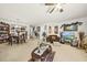 Open concept living room seamlessly connects dining and living areas, with ample natural light at 8520 Quarton Dr, Raleigh, NC 27616