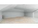 Bright attic space with recessed lighting, offering a clean canvas for customization and storage at 905 Cindy St, Cary, NC 27511