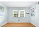 Inviting bedroom with hardwood floors, neutral walls, and lots of natural light at 905 Cindy St, Cary, NC 27511