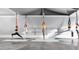 Well-lit gym with aerial yoga hammocks, perfect for a complete workout experience at 905 Cindy St, Cary, NC 27511