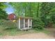 Backyard showcasing a chicken coop and play area, enhancing the outdoor living experience at 905 Cindy St, Cary, NC 27511