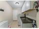 Laundry Room features a sink, granite countertops, washer, dryer, cabinets, and exterior access at 909 Grogans Mill Dr, Cary, NC 27519