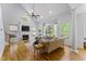 Bright living room with vaulted ceilings, lots of natural light, and a fireplace at 909 Grogans Mill Dr, Cary, NC 27519