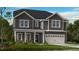 Charming two-story home featuring gray siding, white trim, and a well-maintained lawn at 921 Kinglet House Rd, Knightdale, NC 27545