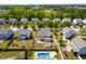 Aerial view of home with in-ground pool and fenced backyard at 112 Gadsbury Dr, Holly Springs, NC 27540
