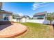 Scenic back yard featuring a storage shed and patio, perfect for entertaining at 112 Gadsbury Dr, Holly Springs, NC 27540
