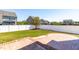 Well-maintained back yard featuring a patio and white fence at 112 Gadsbury Dr, Holly Springs, NC 27540