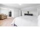 Spacious bedroom with a walk-in closet and neutral walls at 112 Gadsbury Dr, Holly Springs, NC 27540