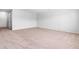 Living room with neutral carpet and a door leading to another room at 112 Gadsbury Dr, Holly Springs, NC 27540