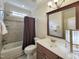 Cozy bathroom with shower-tub combo and vanity at 113 Chesterfield Dr, Cary, NC 27513
