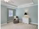 Neutral bedroom with carpet, white trim and tray ceiling at 113 Chesterfield Dr, Cary, NC 27513