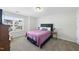 Cozy bedroom with carpet, a queen-size bed, and natural light from the window at 115 Zulabelle Ct, Garner, NC 27529