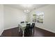 Inviting dining room with sleek hardwood floors and a large window for natural light at 115 Zulabelle Ct, Garner, NC 27529