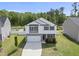 Charming two-story home with a two car garage, complemented by a beautifully landscaped yard at 115 Zulabelle Ct, Garner, NC 27529