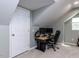 Finished attic space provides an office space with carpeted floors and natural lighting at 117 Whitehaven Ln, Cary, NC 27519