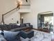 Open concept living area with dining room view and stairs to the second floor with railing at 117 Whitehaven Ln, Cary, NC 27519