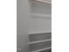 Organized walk-in closet with shelving, perfect for storage and organization at 120 King Charles Rd, Hillsborough, NC 27278