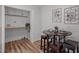 Cozy dining area features a table with seating for four, next to a laundry closet at 120 King Charles Rd, Hillsborough, NC 27278