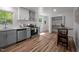 Well-equipped kitchen featuring modern stainless-steel appliances, ample cabinet space, and eat-in dining area at 120 King Charles Rd, Hillsborough, NC 27278