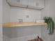 Functional laundry room with overhead cabinets, a folding area, and modern fixtures at 120 King Charles Rd, Hillsborough, NC 27278