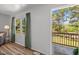Bright room, wooden floor, natural light and a view from the porch at 120 King Charles Rd, Hillsborough, NC 27278