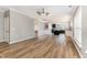 Open-concept living area with hardwood floors, elegant trim, and natural light at 1206 Areca Way, Durham, NC 27703