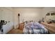 Cozy bedroom featuring a neutral color palette, a comfortable bed, and ample natural light at 123 Charndon Way, Fuquay Varina, NC 27526
