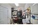 Efficient laundry room with modern washer and dryer, shelving, and plenty of storage space at 123 Charndon Way, Fuquay Varina, NC 27526