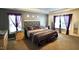 Comfortable bedroom with neutral decor, a well-dressed queen bed, and ambient lighting, creating a serene retreat at 123 Charndon Way, Fuquay Varina, NC 27526