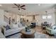 Open concept living room and kitchen with hardwood floors and plenty of natural light at 125 Verona Villa Dr, Burlington, NC 27215
