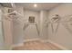 Organized walk-in closet with shelving and ample storage space for clothes and accessories at 125 Verona Villa Dr, Burlington, NC 27215