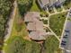 Aerial view of condominium complex with a well-manicured landscape and convenient parking at 128 Schultz St, Chapel Hill, NC 27514