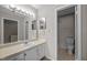 Bathroom with vanity, sink, mirror, lighting, toilet, and shower at 128 Schultz St, Chapel Hill, NC 27514
